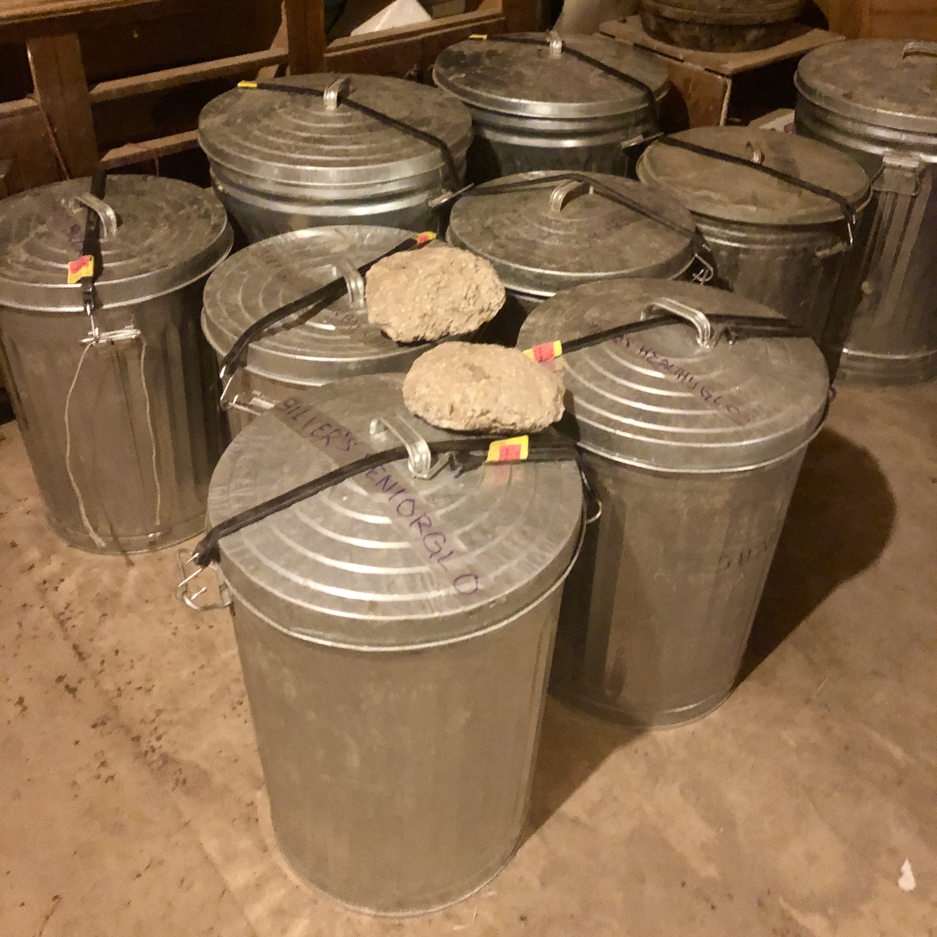 Metal Grain Cans Tied Shut